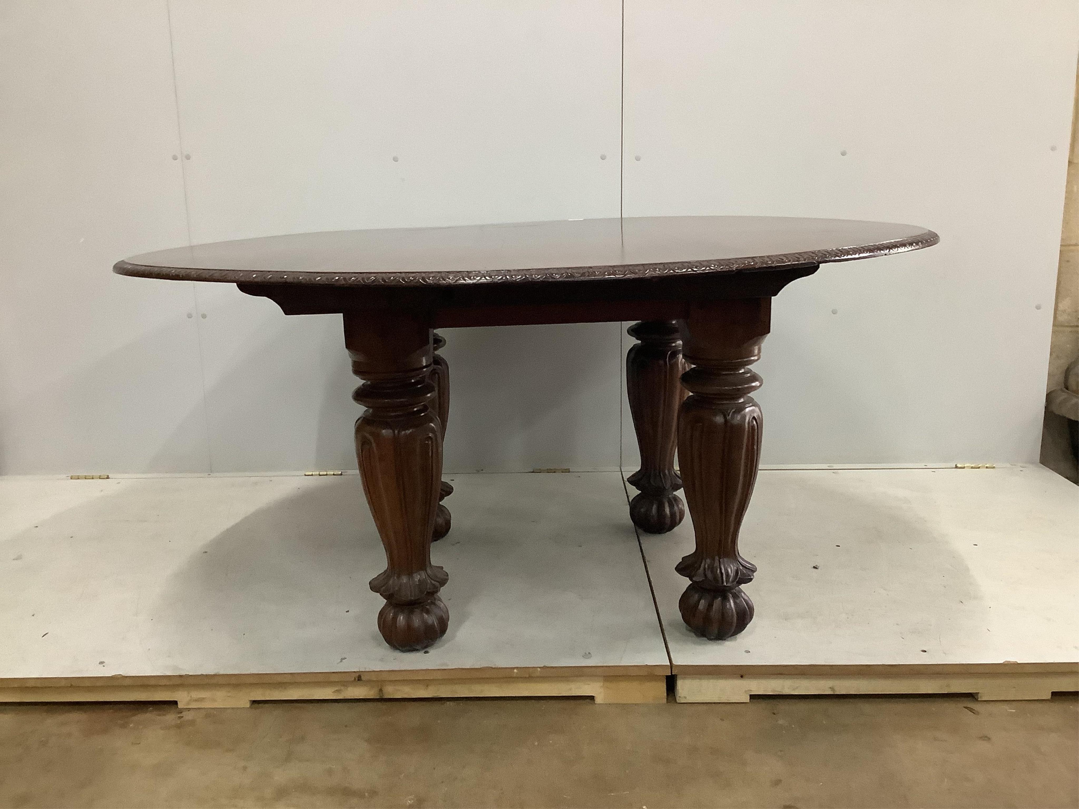 An Indian padouk wood circular top dining table, diameter 152cm, height 74cm. Condition - table has seen some reconstruction, repolished and now good condition